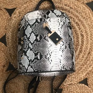 snakeskin backpack purse
